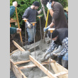 Placing concrete for wall footing (ddr-densho-354-1898)