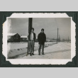 Two men standing in the snow (ddr-densho-471-89)