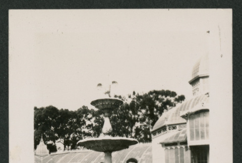 family sitting on a fountain (ddr-densho-378-769)