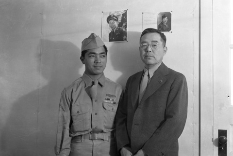 Soldier standing with an unidentified man (ddr-fom-1-369)