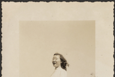 Woman wearing glasses (ddr-densho-433-1110)
