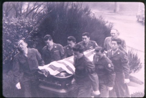 Nine men carrying coffin with American Flag (ddr-densho-330-232)