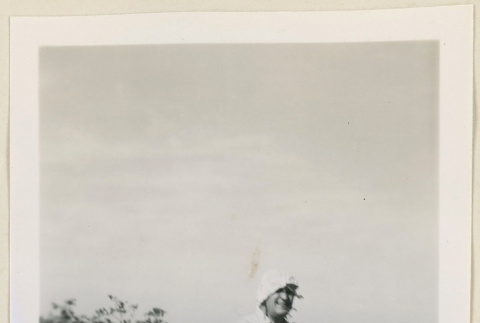 Mr. Bennett in a cotton field (ddr-densho-37-953)