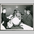 Man at podium reading a document (ddr-densho-293-175)