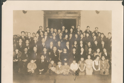 Large group posing for photo (ddr-densho-483-558)