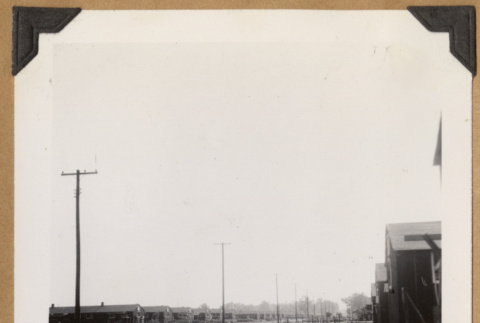 Electricity poles between barracks (ddr-densho-542-145)