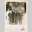 Photo of six men standing on steps (ddr-densho-341-74)