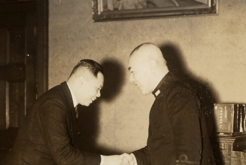 Two men shaking hands (ddr-njpa-1-2569)