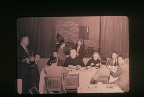 (Slide) - Image of group of men seated around table (ddr-densho-330-197-master-08fe2c6fa0)