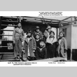 Kono family posing with sailor from Japanese goodwill ship (ddr-ajah-6-339)