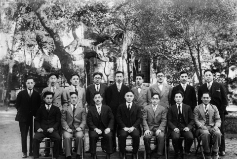 Group of men in suits posing for photo in garden (ddr-ajah-3-172)
