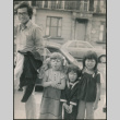 Man with three kids in clown makeup (ddr-densho-523-509)