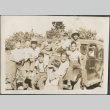 A group of teenagers and children sitting on a truck (ddr-densho-316-60)