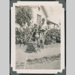 Photo of two boys with a dog in a pram (ddr-densho-483-344)