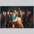 President Ronald Reagan signing the Civil Liberties Act of 1988 (ddr-densho-10-175)