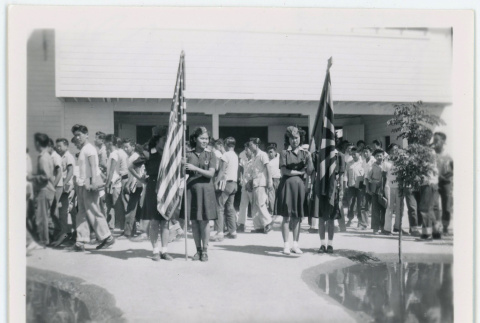 Girl Scout color guard at student assembly (ddr-densho-37-2122)