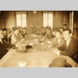 Men gathered at a table (ddr-njpa-4-2407)