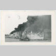 Building engulfed in smoke (ddr-densho-37-2145)