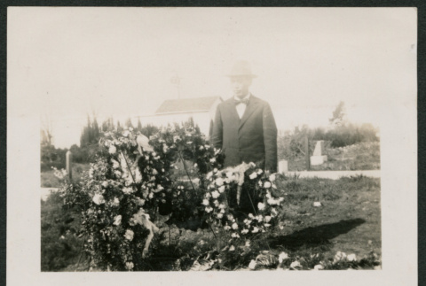 man with floral wreaths (ddr-densho-378-297)