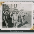 Group of men by army ambulances (ddr-densho-434-94)