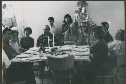 Sakura family around table at Christmas (ddr-densho-523-434)