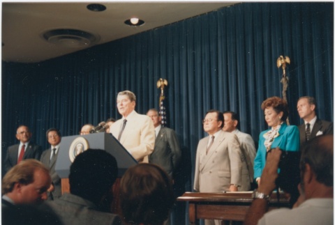 President Ronald Reagan speaking at the signing of the Civil Liberties Act of 1988 (ddr-densho-10-176)