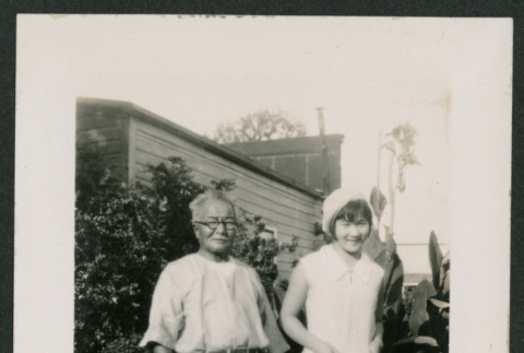 man and woman in garden (ddr-densho-378-861)