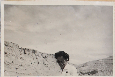 Woman with dry cliffs in background (ddr-densho-464-89)