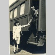 Herbert K. Yanamura and his wife [?] saying goodbye (ddr-densho-22-381)