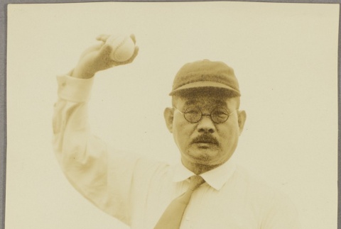 Isaku Fujimoto throwing a baseball (ddr-njpa-5-550)
