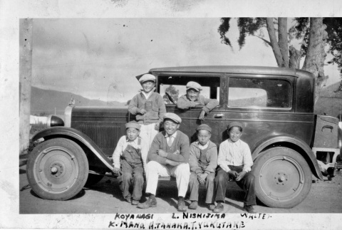 Group of six young people with car (ddr-densho-1007-50)