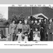 Group of women and children outside building (ddr-ajah-4-60)