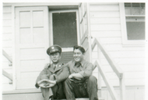 Officer and one other on stoop (ddr-densho-1007-603)
