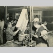 Japanese Americans making mochi (ddr-densho-159-163)