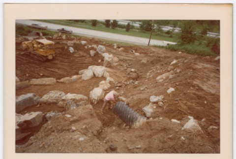 Rock waterfall and pond under construction (ddr-densho-377-2197)