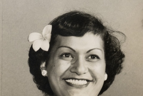 Woman with a flower in her hair (ddr-njpa-2-315)
