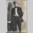 Man in bow tie and hat (ddr-densho-355-642)