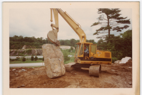 Moving boulder with excavator (ddr-densho-377-2208)