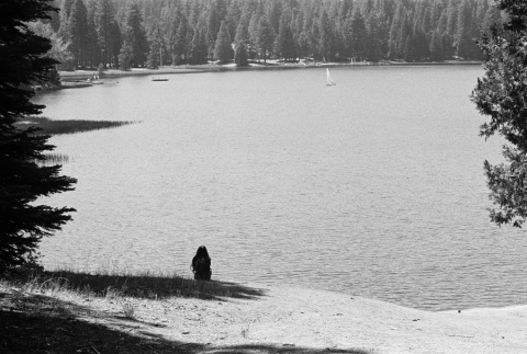 Stephanie Kawata sitting on the lakeshore (ddr-densho-336-442)