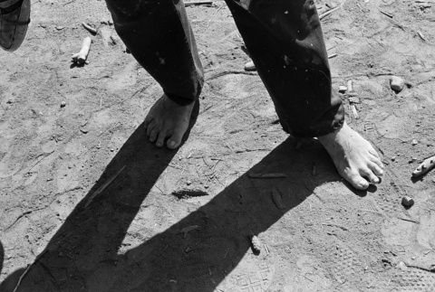 Bare feet in sand (ddr-densho-336-450)