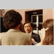 Gordon Hirabayashi being interviewed outside the courthouse (ddr-densho-10-74)