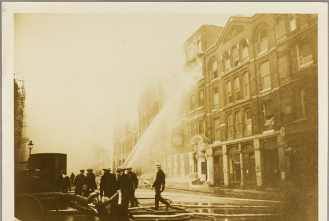 Auxiliary Fire Servicemen spraying water on a building (ddr-njpa-13-249)