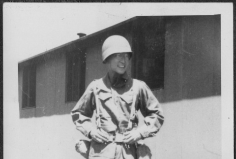 Man standing in full gear (ddr-densho-434-496)