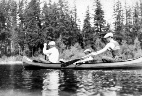 Three boys canoeing (ddr-densho-18-70)