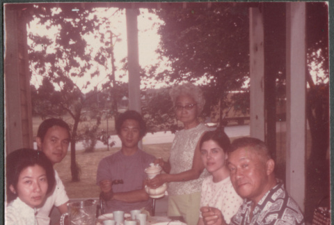 Group sitting around table (ddr-densho-523-577)
