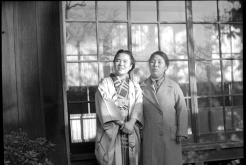 Two women standing by building (ddr-densho-426-300)