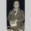 Wade Warren Thayer in scoutmaster uniform, wearing medals and a lei (ddr-njpa-2-953)