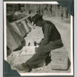 Man chipping marble (ddr-densho-201-589)