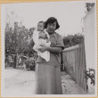 Yoshiko Shiomi holding Susan Shiomi (ddr-densho-522-142)