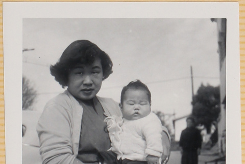 Yoshiko Shiomi holding Leslie Shiomi (ddr-densho-522-346)